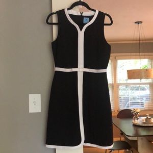 Black Dress with White Trim and a Bow